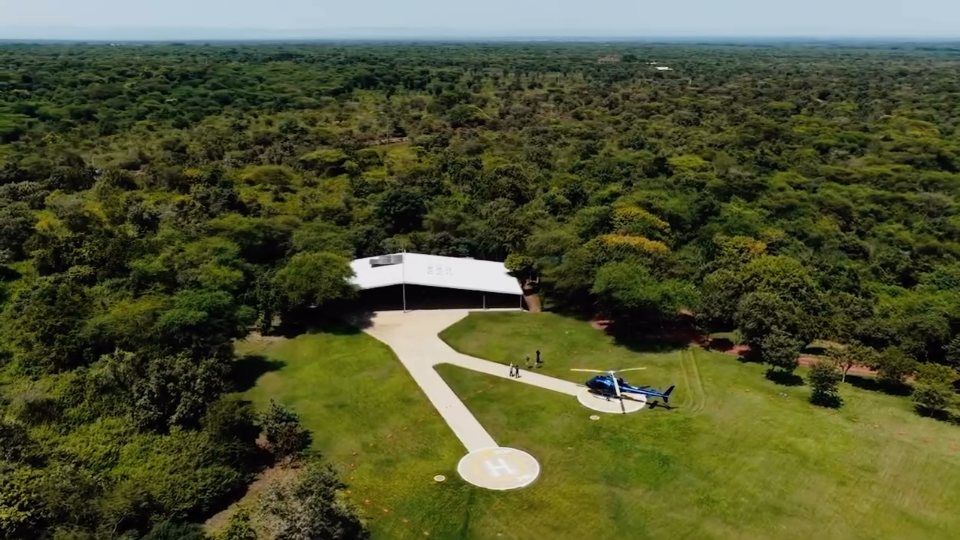 A helicopter set down on the lawn.